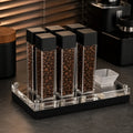 Ristrevo Bean Cellar mit sechs transparenten Aufbewahrungsröhrchen für einzelne Kaffeebohnendosen